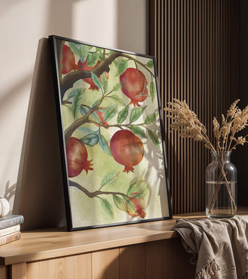 Watercolor illustration of pomegranates on a branch with leaves