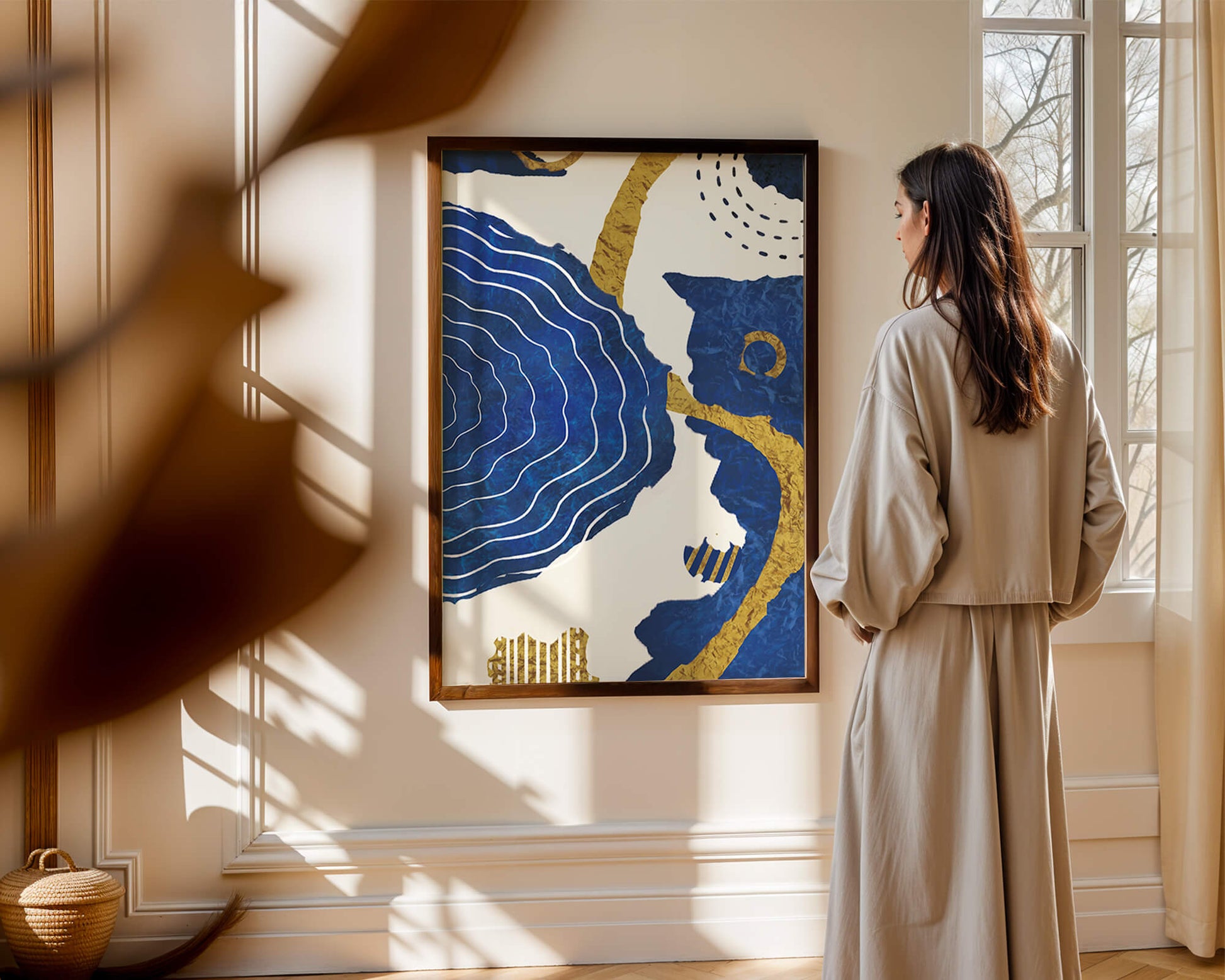 Abstract blue and gold textured artwork with wave patterns