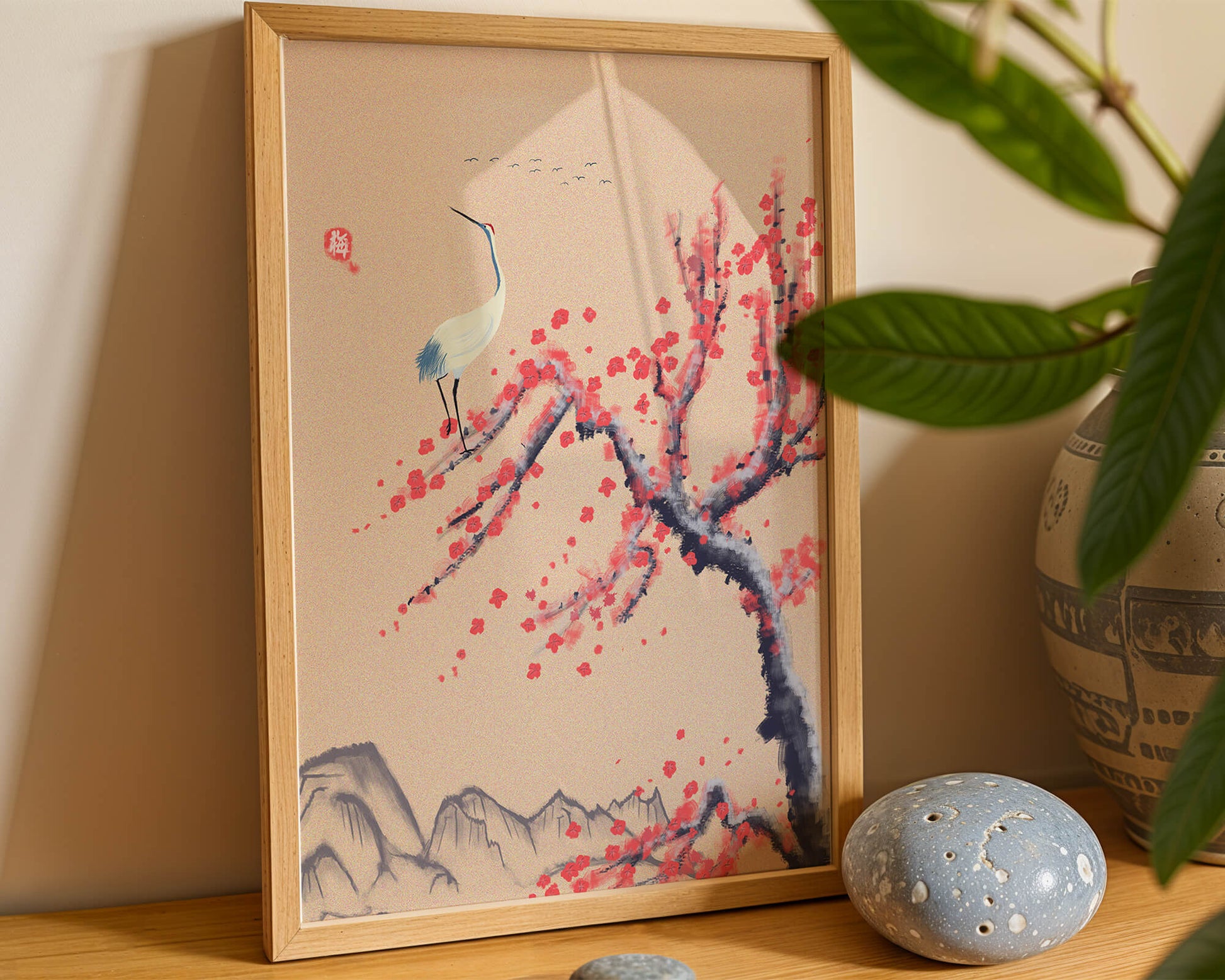 Elegant crane on cherry blossom tree with mountainous background