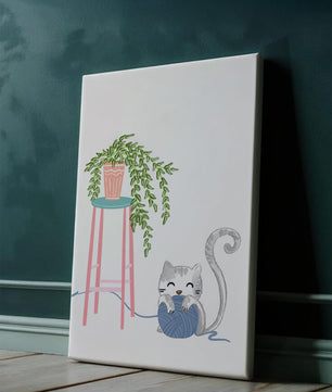 Cat Playing with Yarn Beside a Potted Plant on Pink Stool - Mi tienda