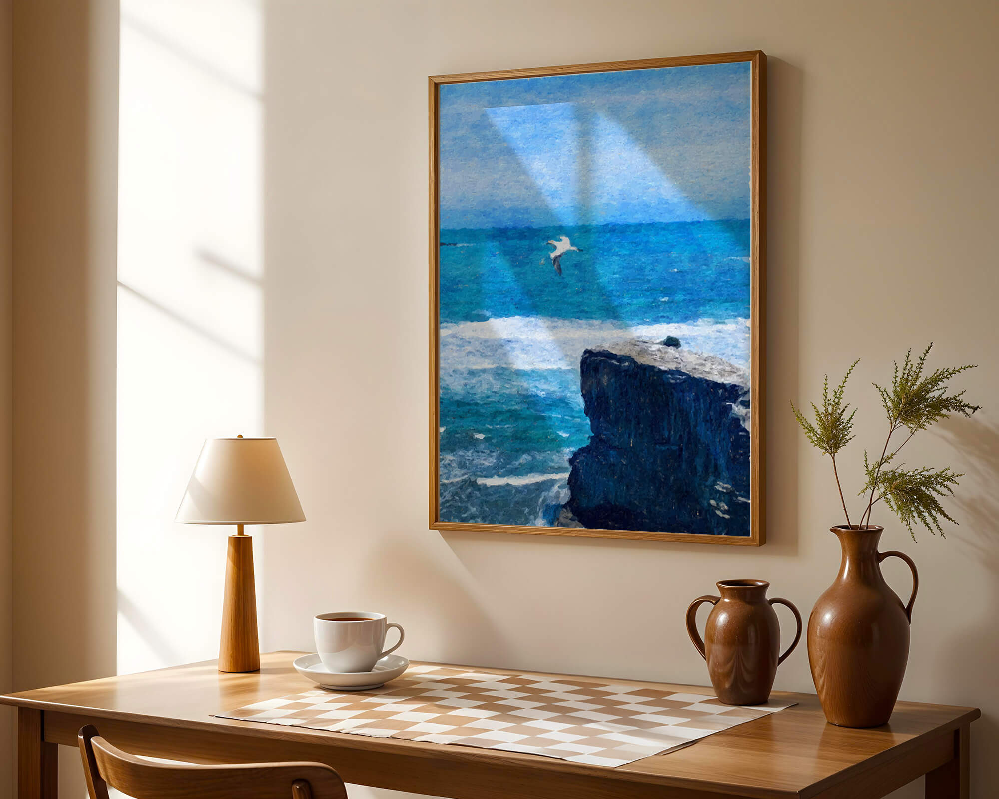 Seascape with soaring seagull over rocky cliff and ocean waves