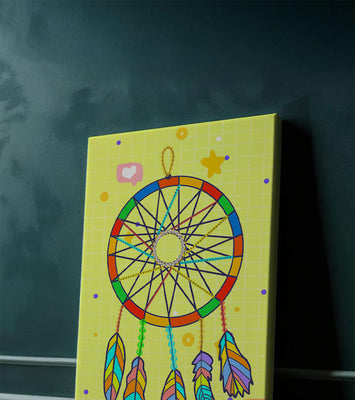 Colorful dreamcatcher on a vibrant yellow background