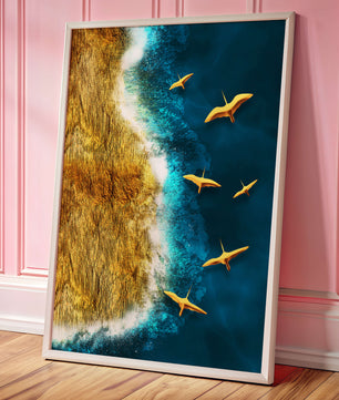 Golden beach landscape with vibrant ocean and flying seabirds