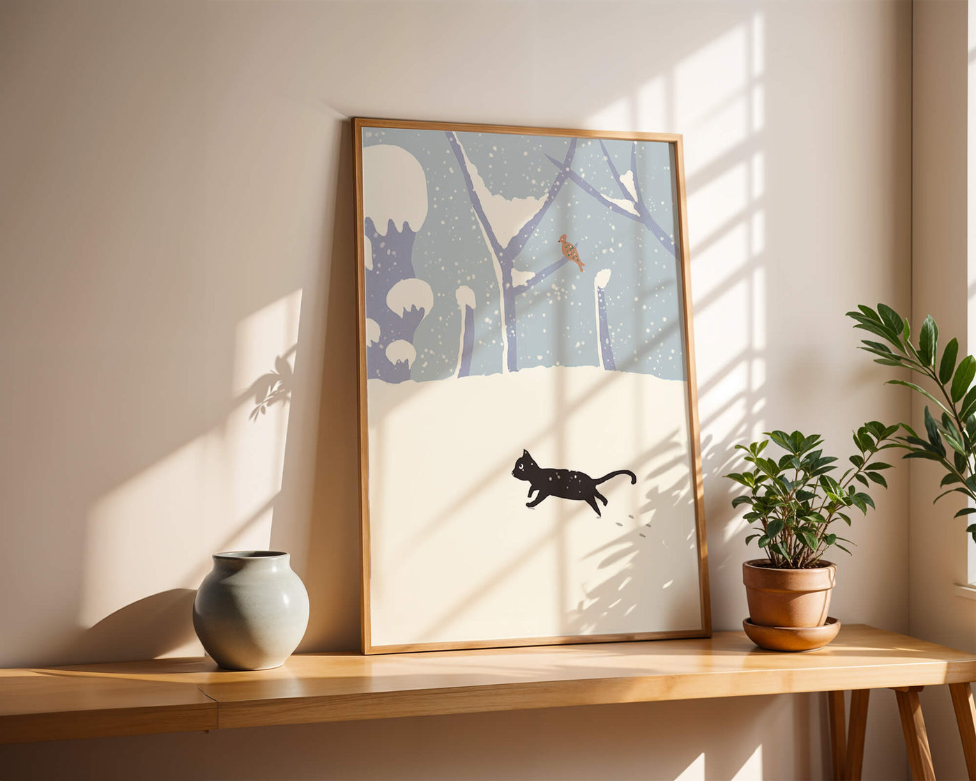 Illustrated snowy landscape with playful black cat and bird in winter scenery