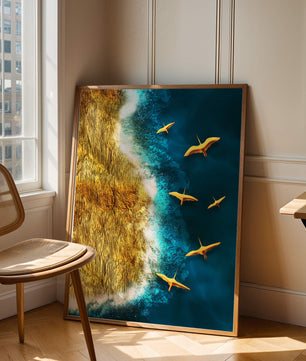 Golden beach landscape with vibrant ocean and flying seabirds