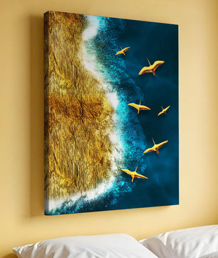 Golden beach landscape with vibrant ocean and flying seabirds