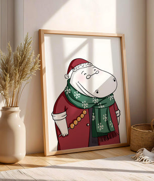 Festive hippo in a red outfit with a green snowflake scarf