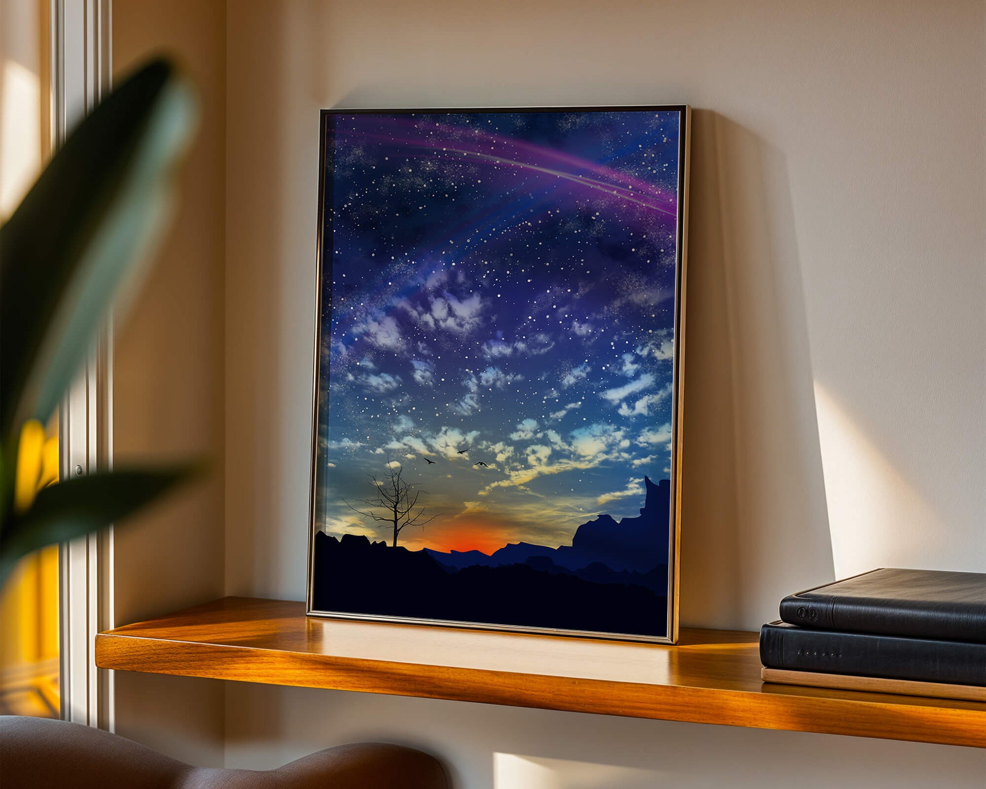 Starlit night sky with colorful sunset and silhouetted landscape