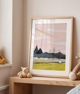 Serene landscape with mountains, village, and a girl under a pink sky