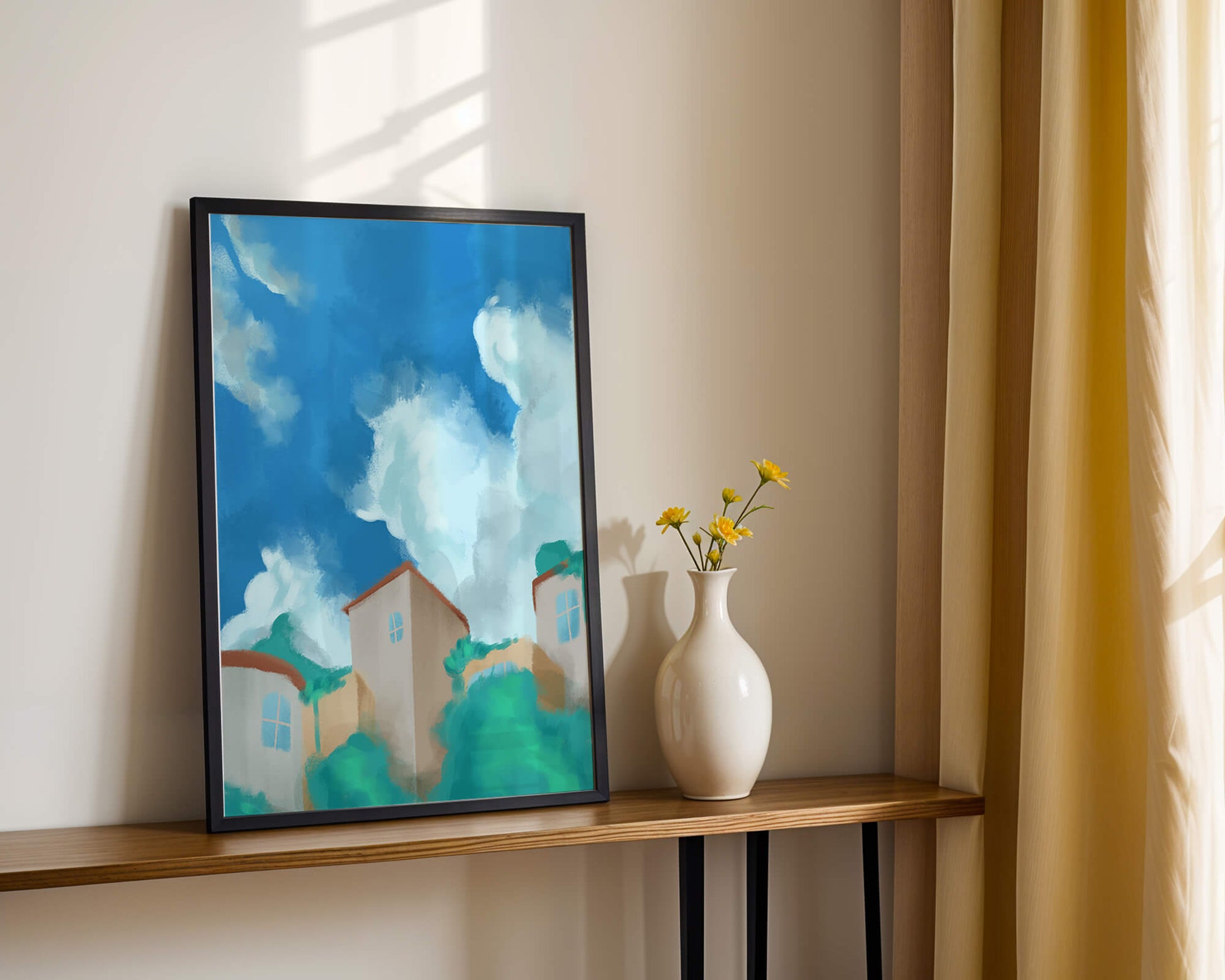 Serene landscape with houses and fluffy clouds against a blue sky