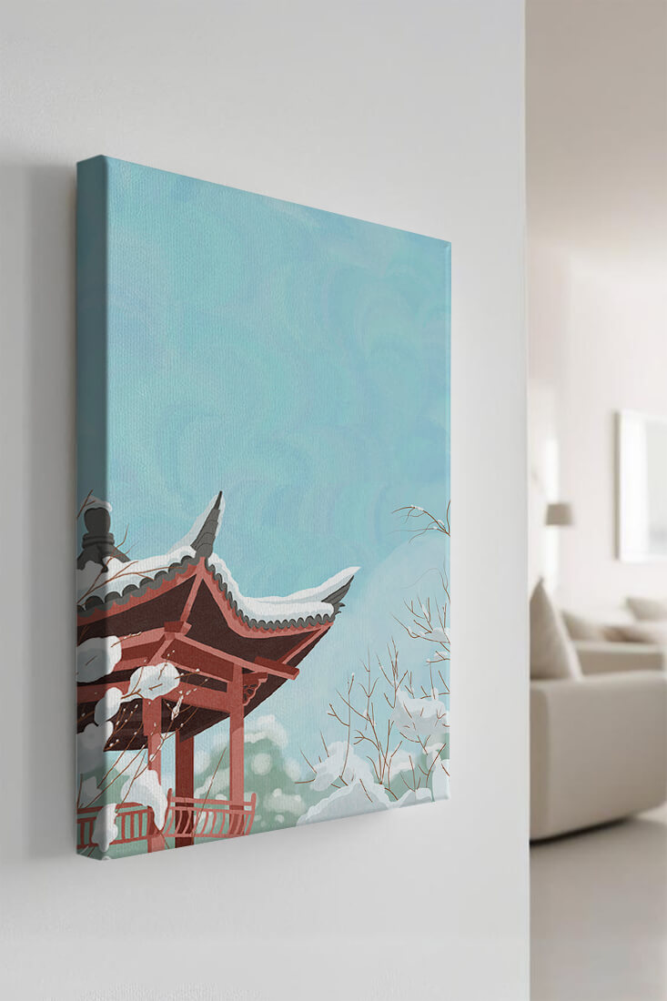 Snow-covered traditional pagoda under a clear blue sky