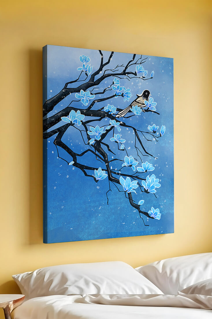 Bird on a branch with blue flowers against a snowy background