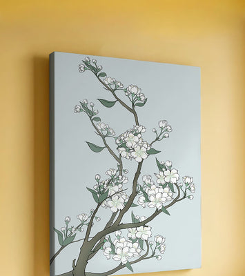 Delicate cherry blossoms on a soft blue background