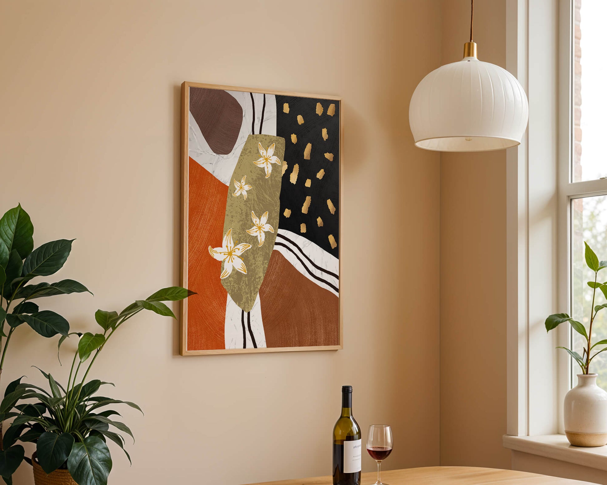 Abstract floral artwork with gold accents and earthy tones