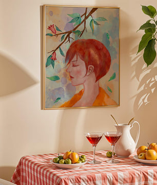 Illustrative artwork of a woman with red hair and floral branch
