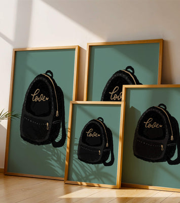 Elegant black backpack with gold accents and love inscription
