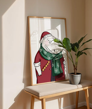 Festive hippo in a red outfit with a green snowflake scarf
