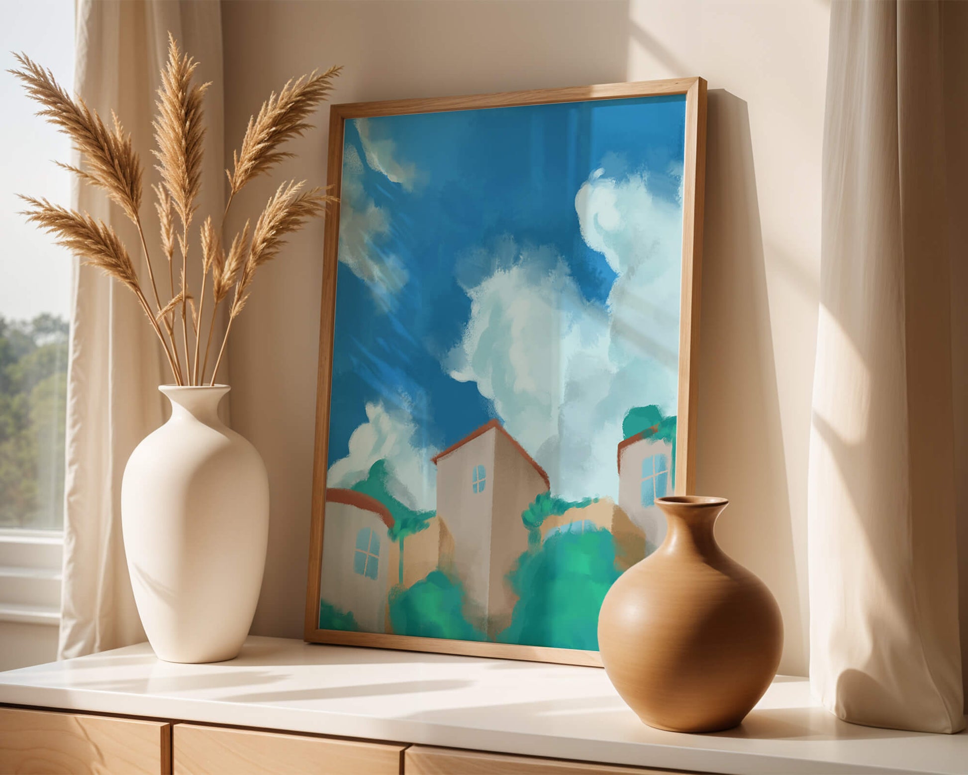 Serene landscape with houses and fluffy clouds against a blue sky