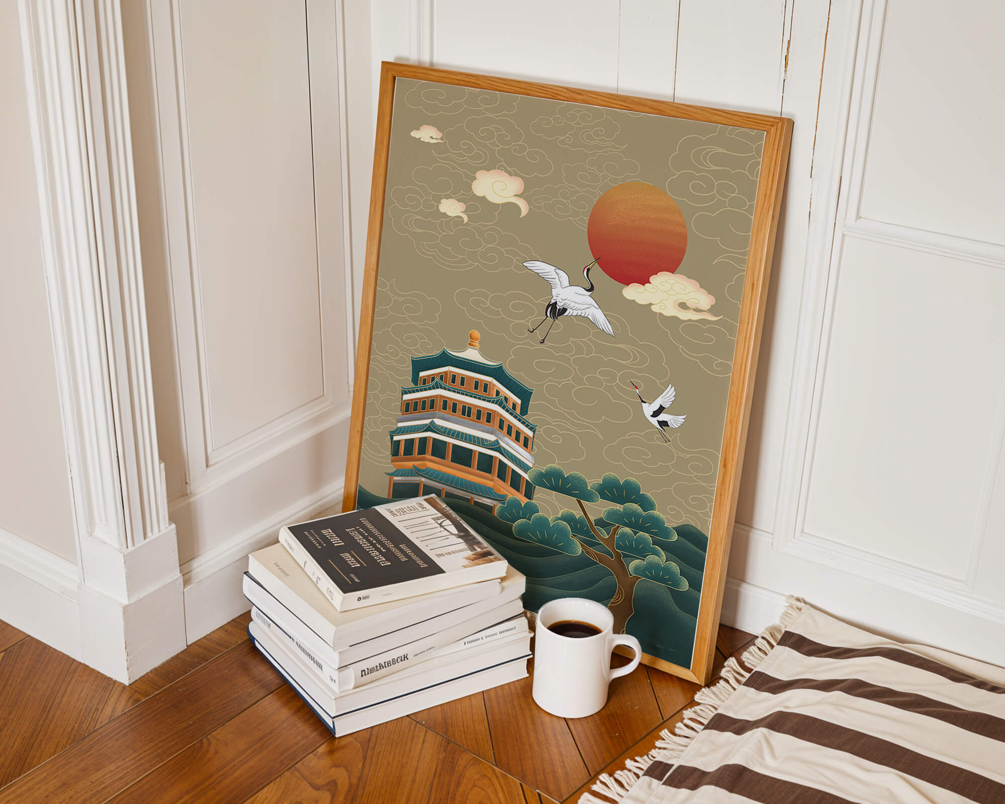 Traditional Asian artwork with cranes and pagoda under a red sun