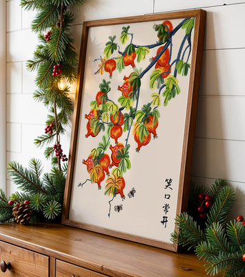 Artistic illustration of vibrant pomegranates on a branch with Asian aesthetic