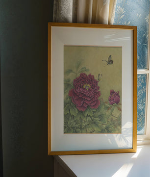 Delicate peonies with butterflies in a serene natural setting