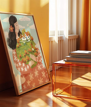 Femme fantaisiste tenant un paysage miniature avec famille et maisons