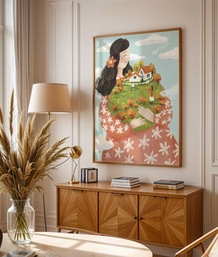Femme fantaisiste tenant un paysage miniature avec famille et maisons
