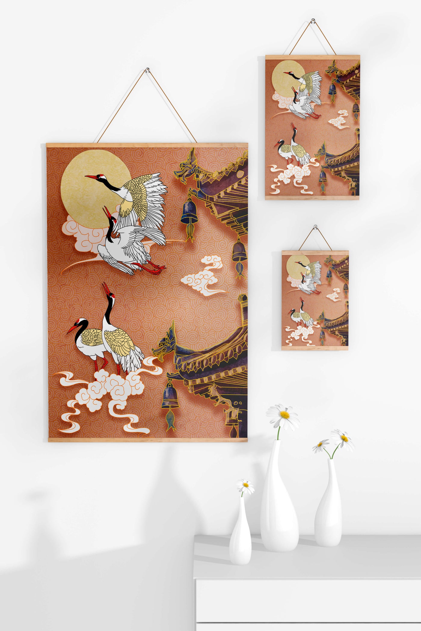 Elegant cranes flying beside traditional Asian architecture under moonlight