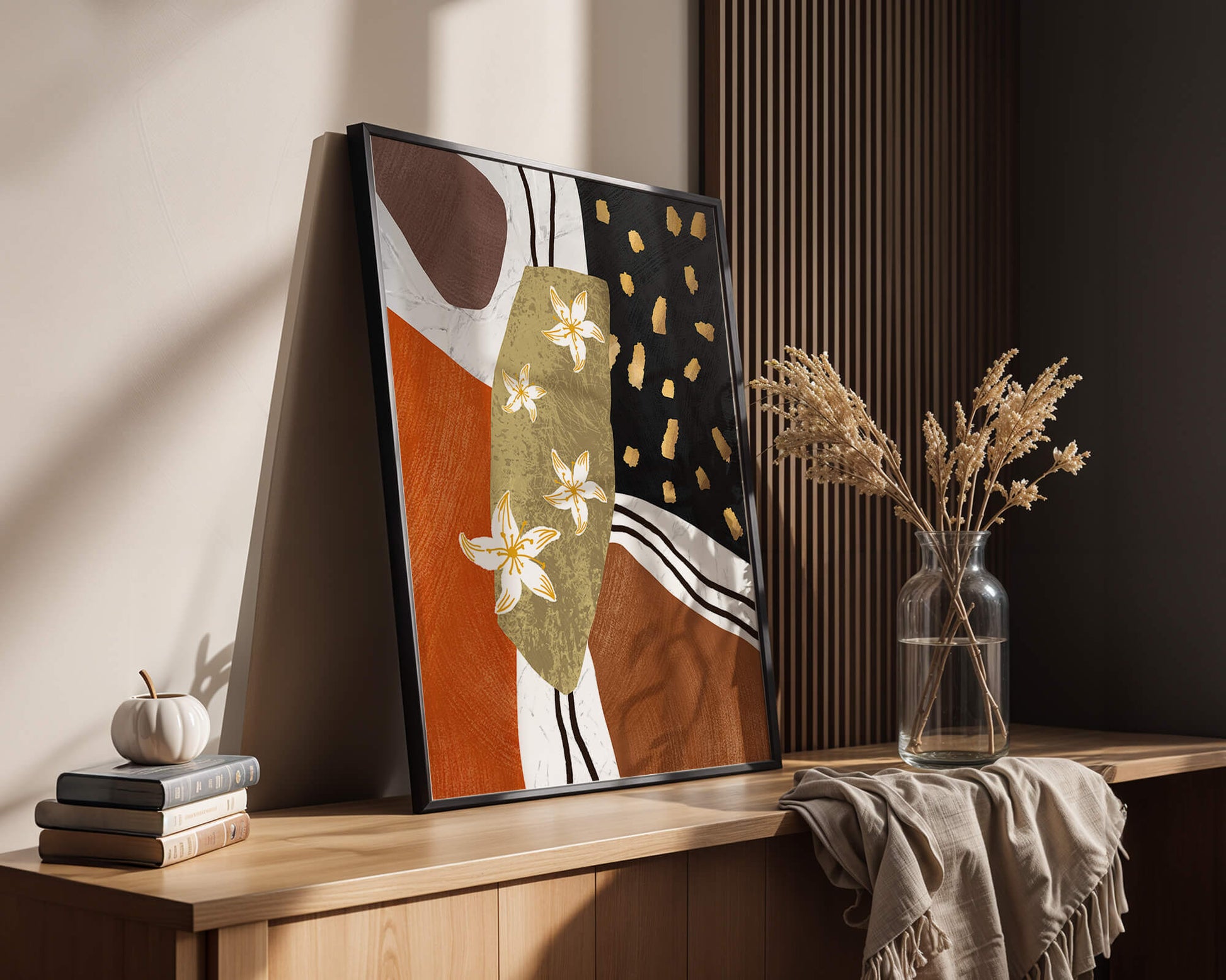 Abstract floral artwork with gold accents and earthy tones