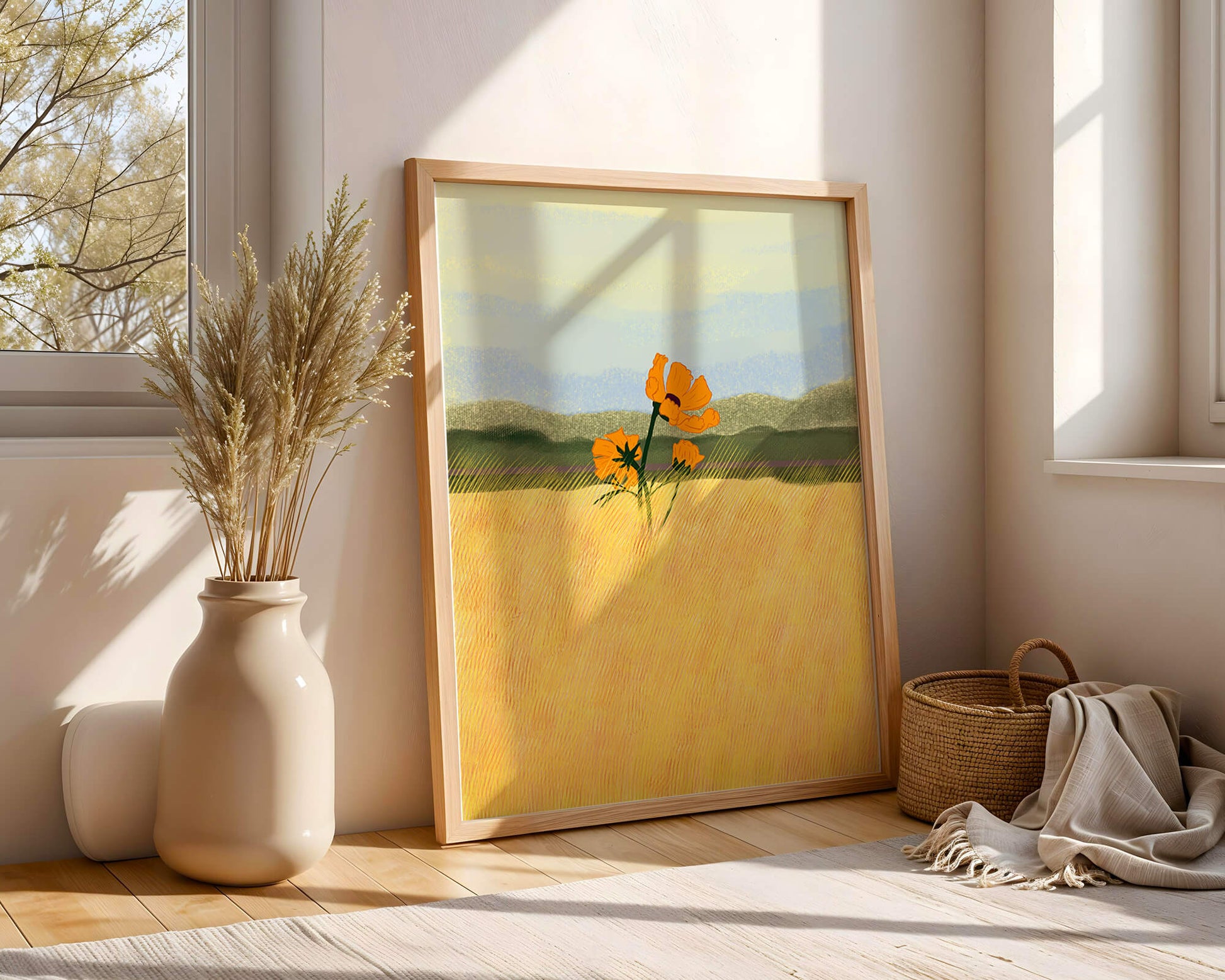 Orange Flowers in a Golden Field with Mountains and Blue Sky
