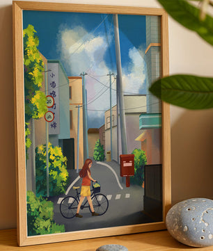 Young woman with bicycle in a quiet urban street