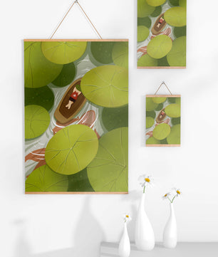 Person in boat among lush green lily pads
