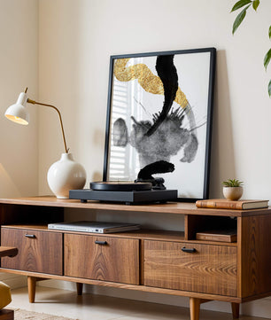 Abstract black and gold brushstrokes with textured patterns