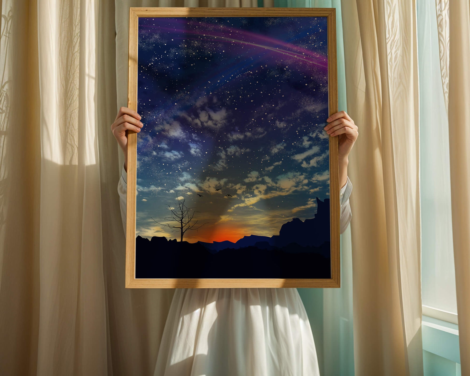 Starlit night sky with colorful sunset and silhouetted landscape
