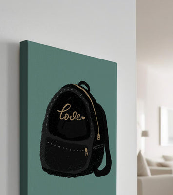 Elegant black backpack with gold accents and love inscription