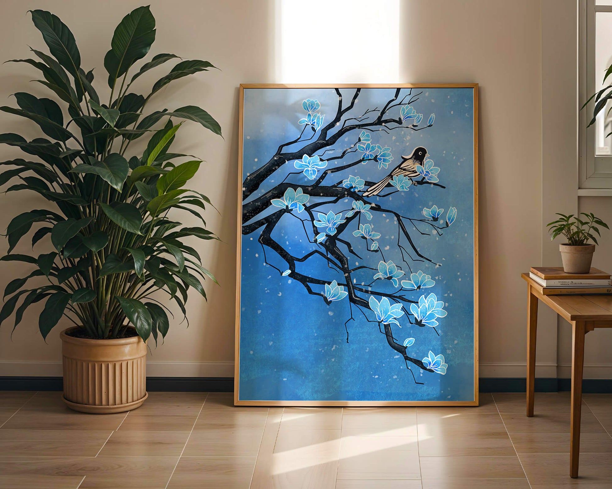 Bird on a branch with blue flowers against a snowy background