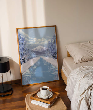 Serene winter landscape with mountain and snowy trees reflecting in water