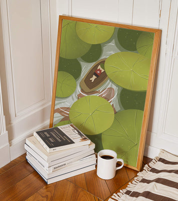 Person in boat among lush green lily pads