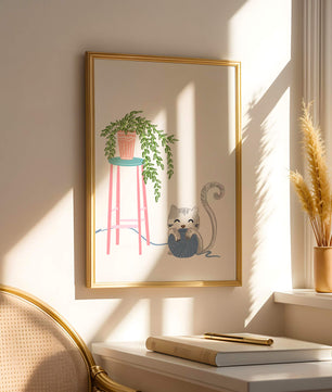 Cat Playing with Yarn Beside a Potted Plant on Pink Stool - Mi tienda