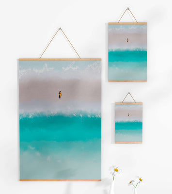 Serene beach with turquoise waves and solitary figure
