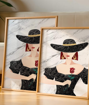 Elegant woman in wide-brimmed hat holding a rose on marble background
