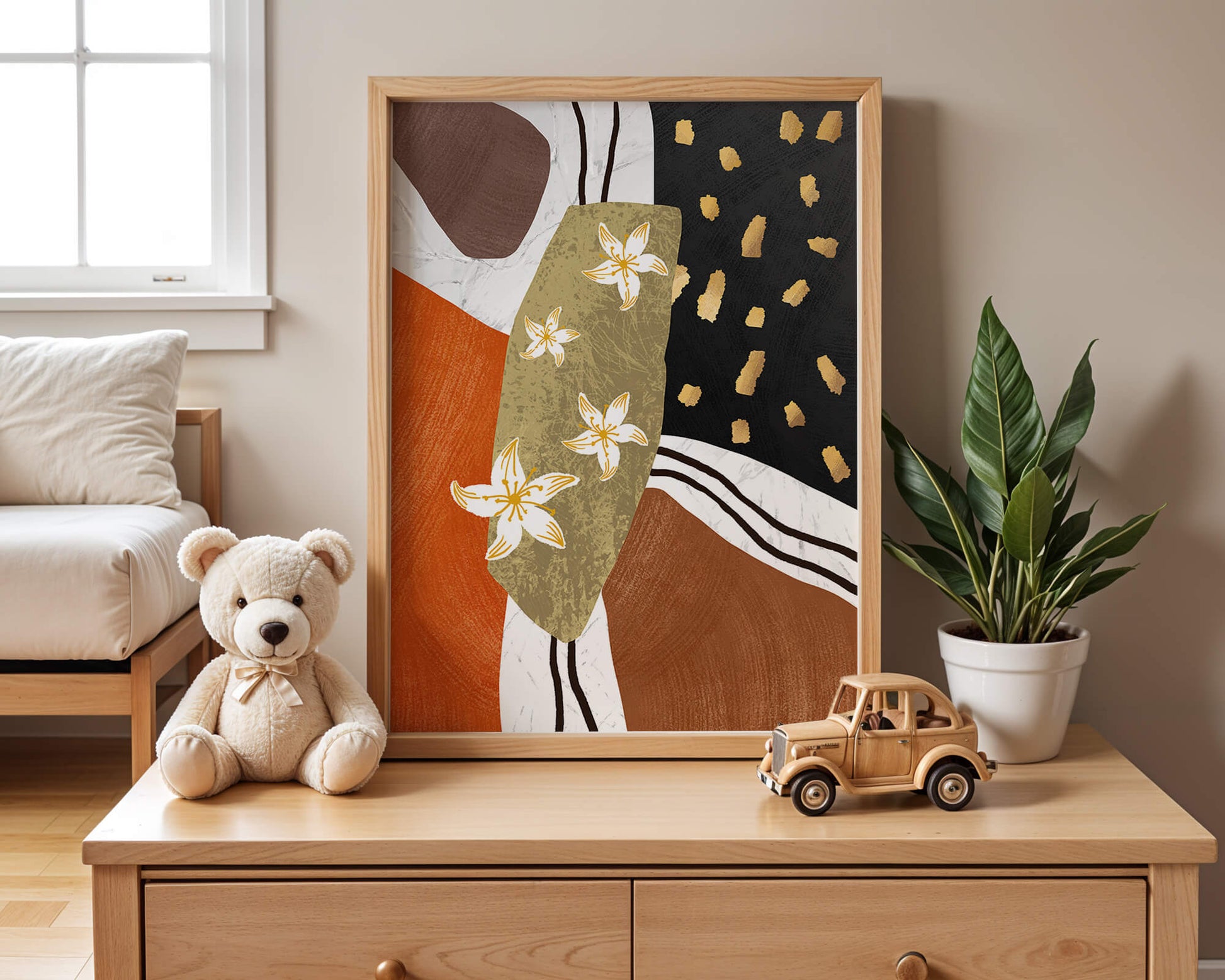 Abstract floral artwork with gold accents and earthy tones