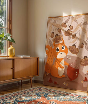 Orange Squirrel with Acorn in Autumn Forest