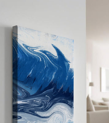 Abstract blue and white ocean wave painting with swirling patterns
