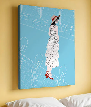 Stylish woman in polka dot dress with hat in modern abstract scene