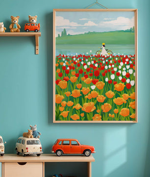 Woman with bicycle in vibrant tulip field by a lake
