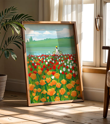 Woman with bicycle in vibrant tulip field by a lake