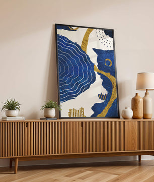 Abstract blue and gold textured artwork with wave patterns