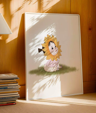 Adorable child with sunflower costume sitting on a grassy patch