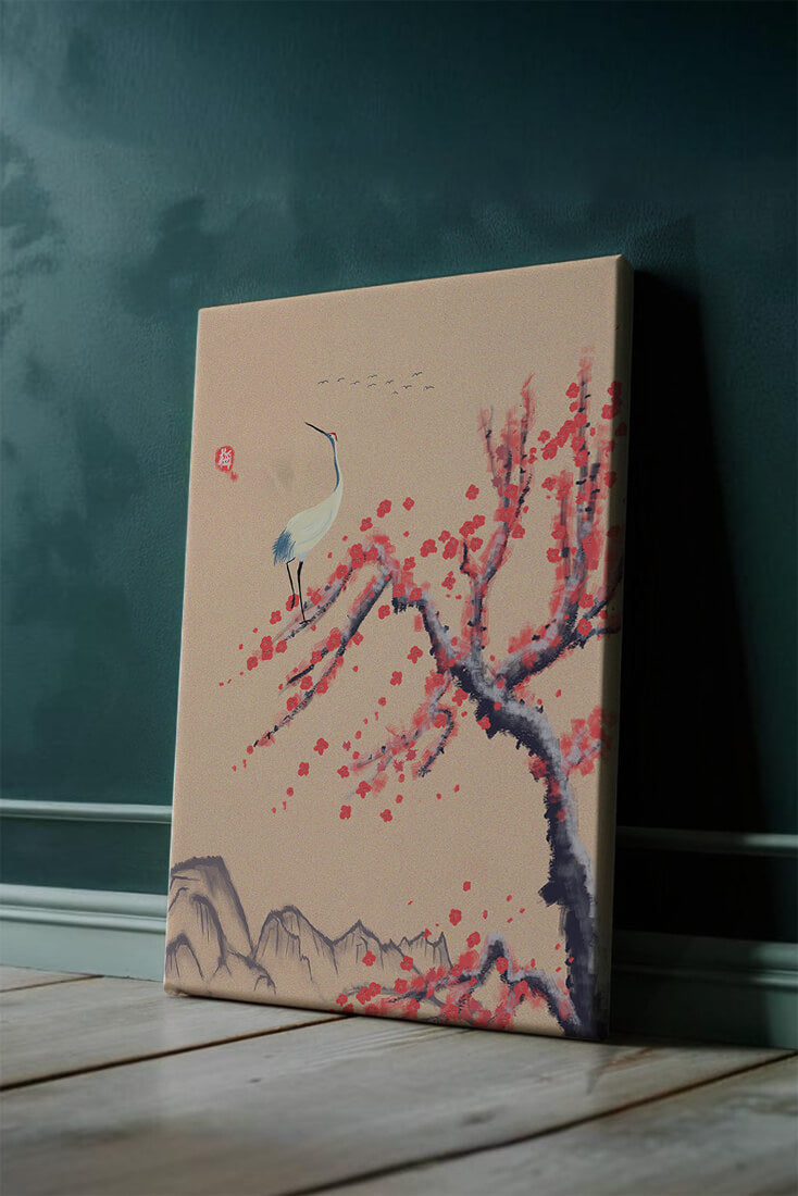 Elegant crane on cherry blossom tree with mountainous background